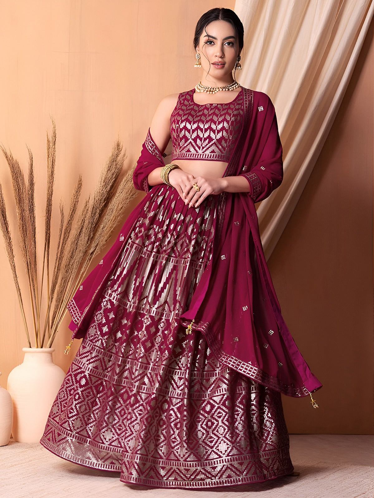 Shop Ruby Pink Georgette Lehenga Choli with elegant thread and sequins embroidery. Semi-stitched with matching blouse and dupatta, perfect for weddings, receptions, festivals, and party wear.