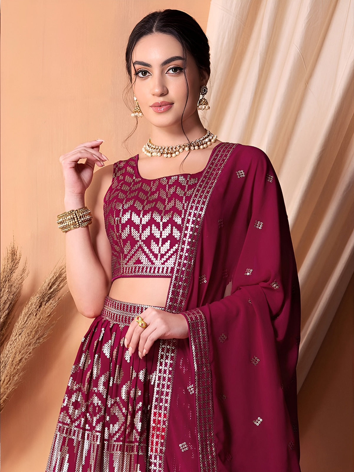 Shop Ruby Pink Georgette Lehenga Choli with elegant thread and sequins embroidery. Semi-stitched with matching blouse and dupatta, perfect for weddings, receptions, festivals, and party wear.