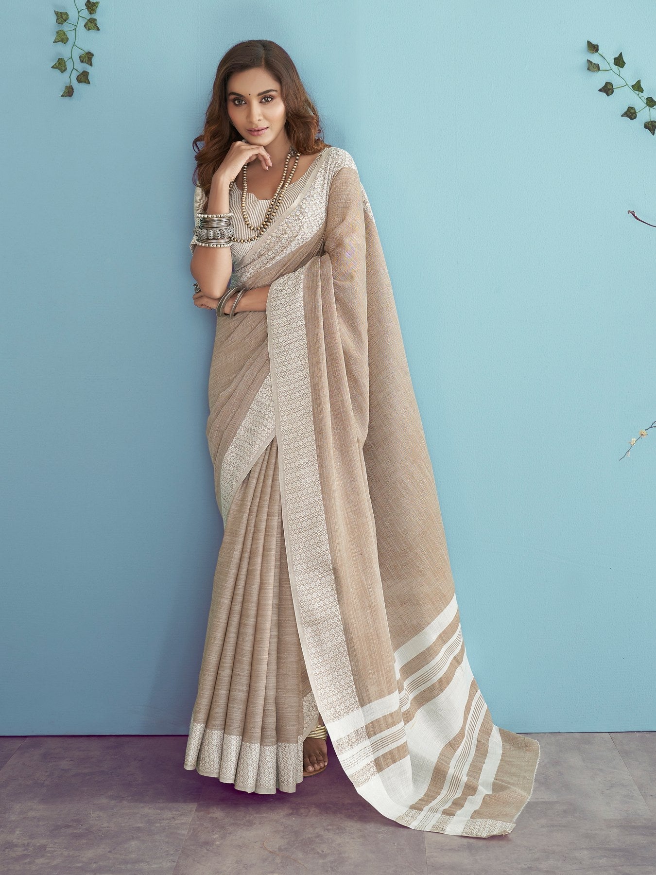 Graceful Beige Linen Silk Saree with Chikankari Border for Parties and Weddings