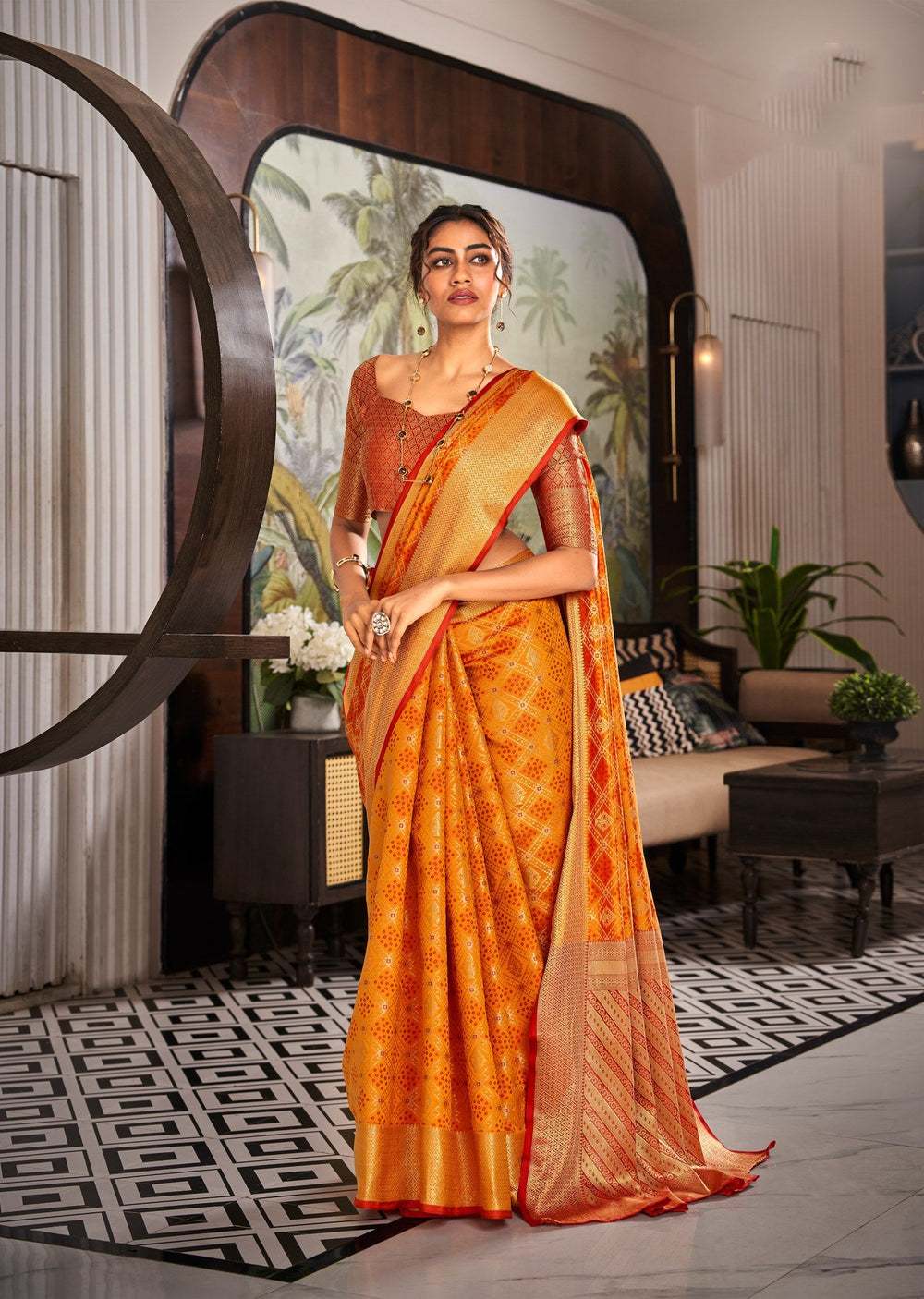 Elegant Orange Patola Saree: Soft Handloom Weaving for Timeless Traditional Charm