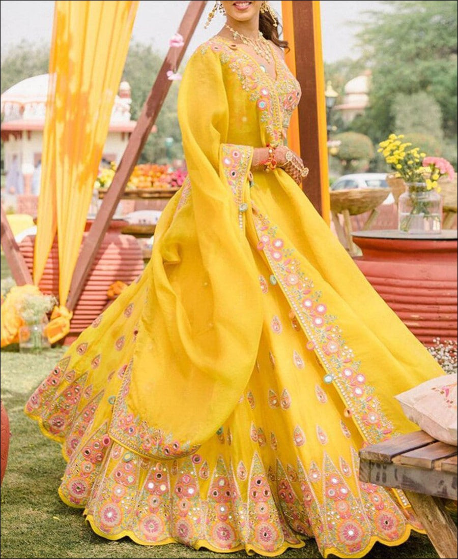 Radiant Yellow Lehenga Choli: Exquisite Thread Sequence Embroidery on Georgette