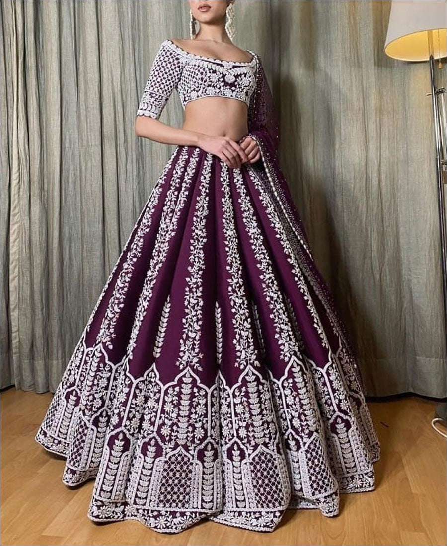 Elegant Purple Lehenga Choli adorned with Intricate Corded Sequin Embroidery and Luxurious Chinon Fabric