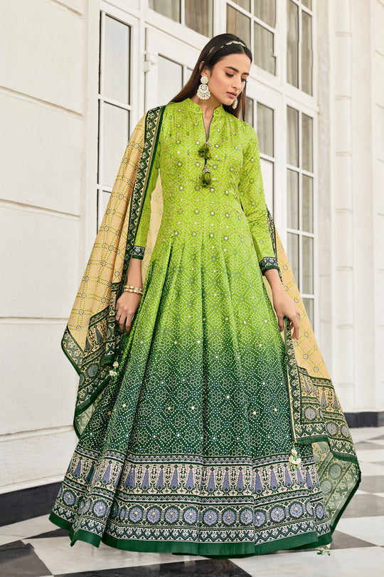 Elegant Green Bandhani Silk Gown with Handwork and Designer Kali for Weddings & Parties